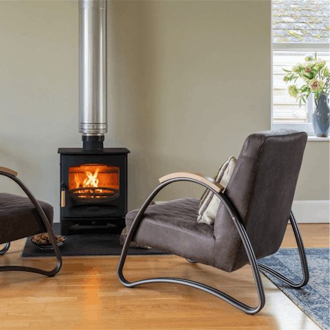 Get cosy in front of the log burner on a chilly evening