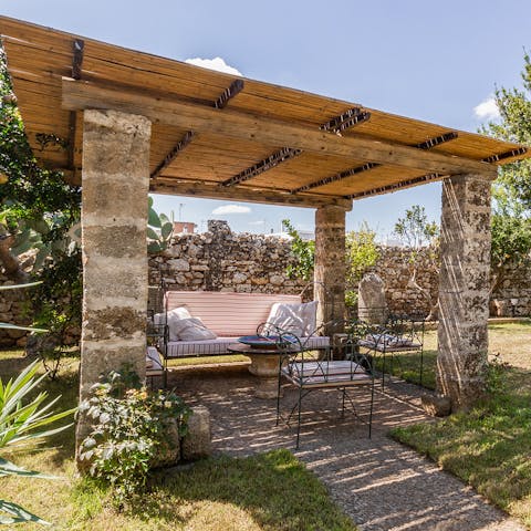 Sit out under the shade of the pergola with a morning espresso