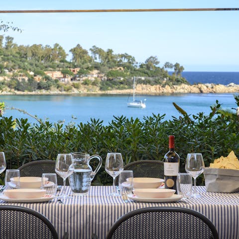 Enjoy the views across the bay of Portu Frailis from the terrace 