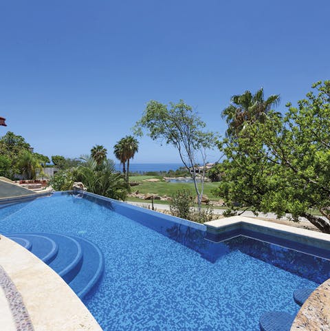 Take a dip in the sparkling swimming pool