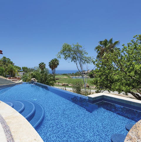 Take a dip in the sparkling swimming pool