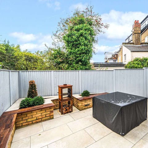 Unwind in the patio garden when the sun is shining