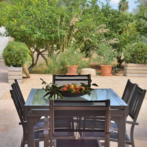 Gather around the outdoor dining table for leisurely breakfasts in the sun