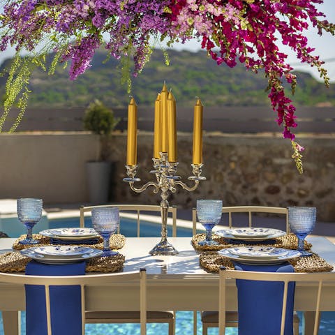 Feast on a dinner cooked by a private chef on your villa's balcony with views of the Lesvos hills