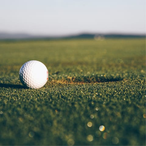Play golf at one of two golf courses – there's also a driving range to work on your swing