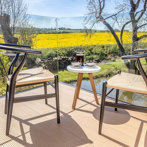 Gaze out at the rolling scenery from the suntrap balcony