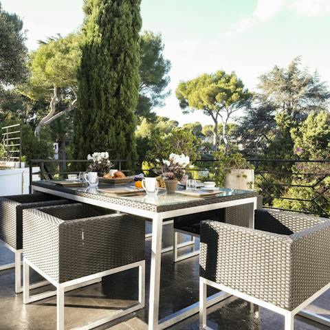Set the table for alfresco meals on the tranquil roof terrace