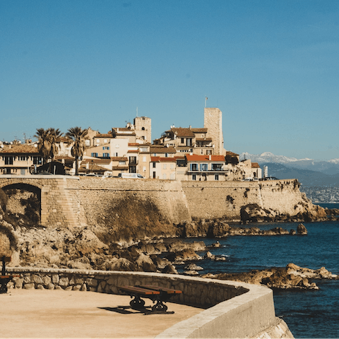 Meander through the cobbled lanes of Old Town Antibes,  a five-minute drive away