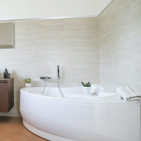 End the day with a relaxing soak in the whirlpool bathtub