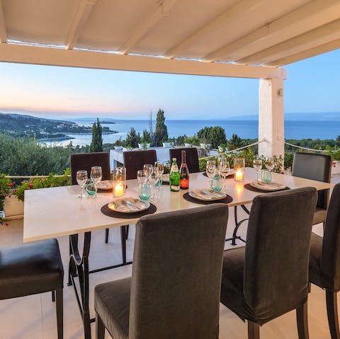 Tuck into a candlelit dinner looking out over the harbour